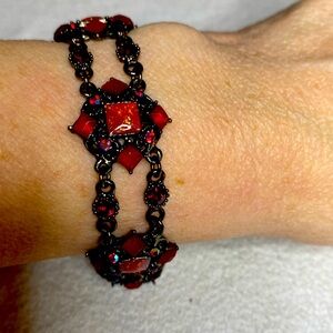Beautiful Ruby toned bracelet